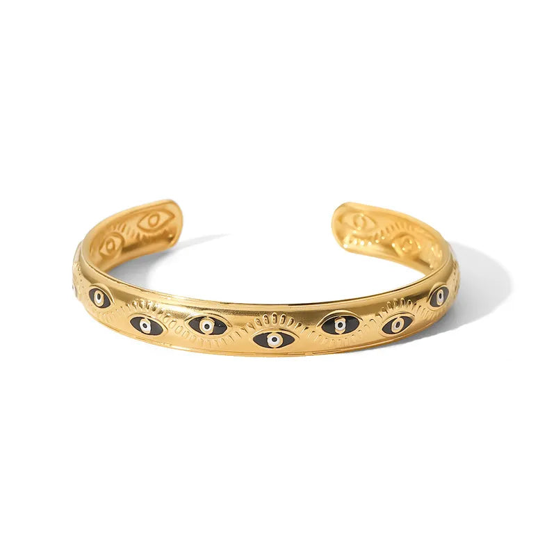 Adora London Medusa bangle Medusa inspired gold plated bangle
