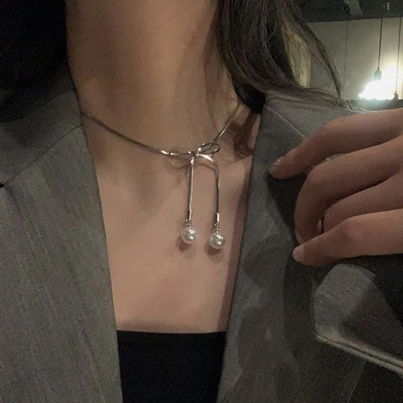 Adora London The Bow Necklace Stainless steel pearl bow detailed necklace