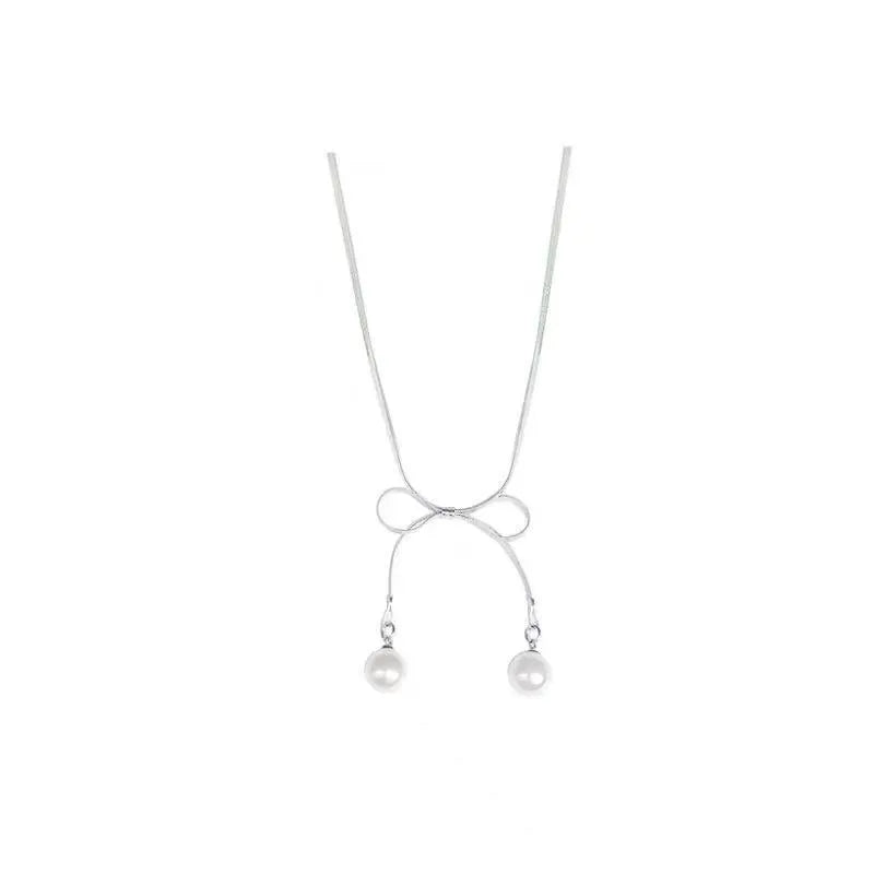 Adora London The Bow Necklace Stainless steel pearl bow detailed necklace