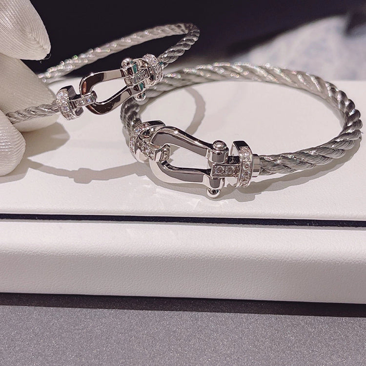 Adora London The Hattie Bangle Horseshoe Stainless Steel RHinestone detailing bangle with buckle in silver