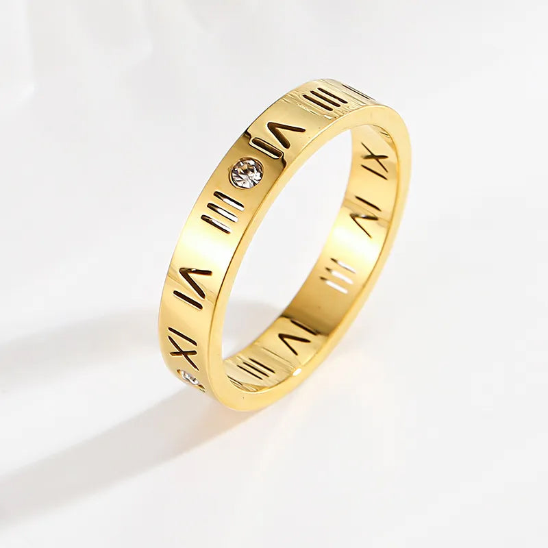 Adora London Roman Ring Roman detailed letter band ring with gemstones