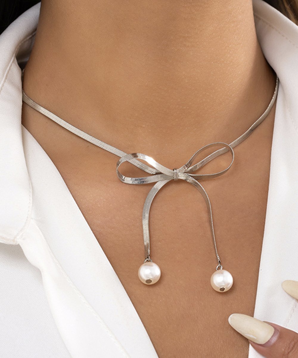 Adora London The Bow Necklace Stainless steel pearl bow detailed necklace