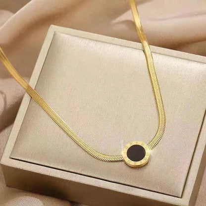 Adora London The Cleo Necklace Round circle detailed neclace gold plated with black inner detailing